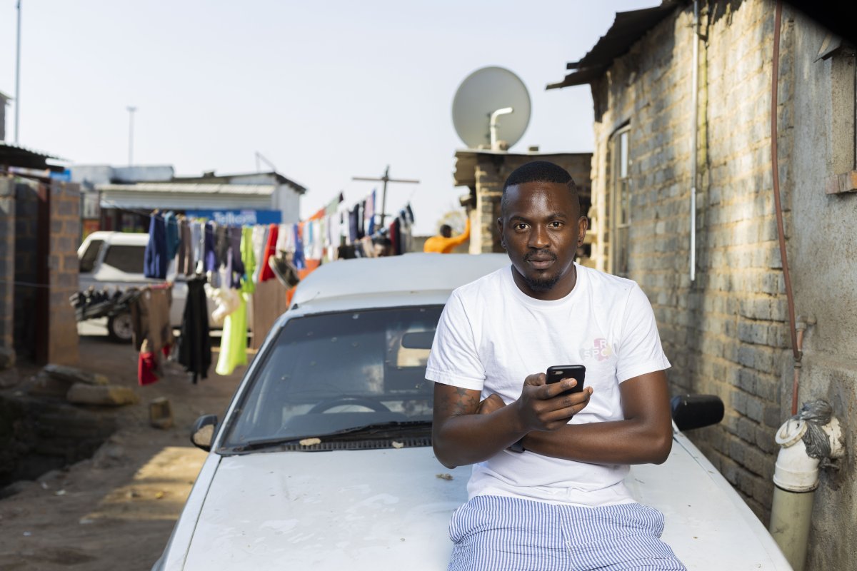 Holding a smartphone in Alex