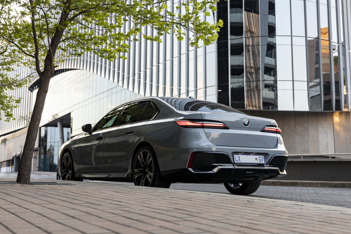 A very presidential BMW i740i parked on the side of the road