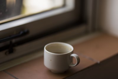 Coffee mug by a window