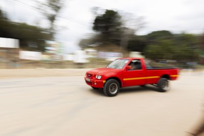 Red truck car going fast