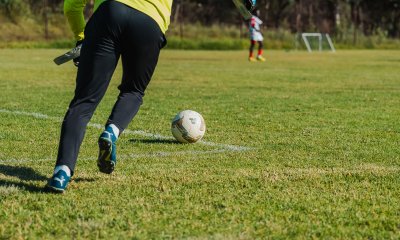 Soccer player kicking a ball