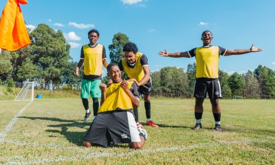 Reserve players celebrating a goal in a soccer match