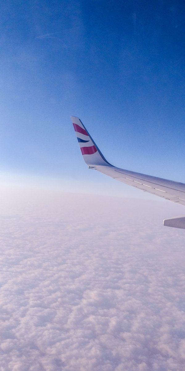 Airplane wing in the sky