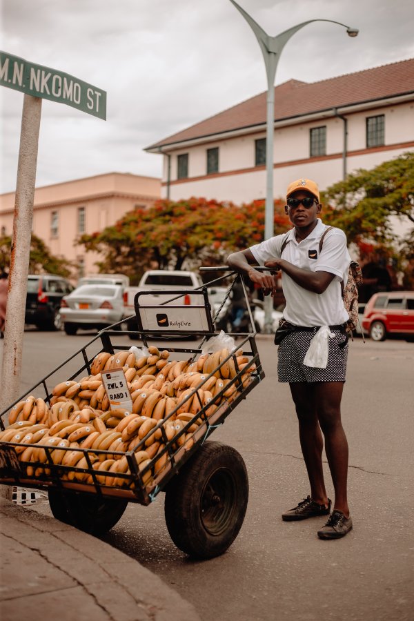 Fruit vendor selling bananas
