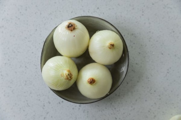 Onions in a bowl on counter