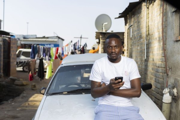 Holding a smartphone in Alex