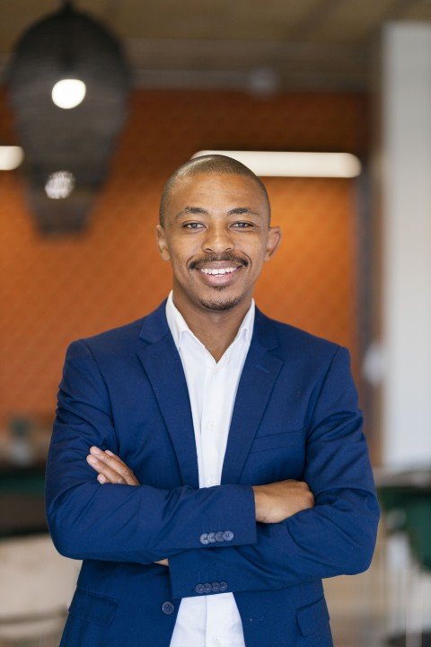 Black business man profile photo