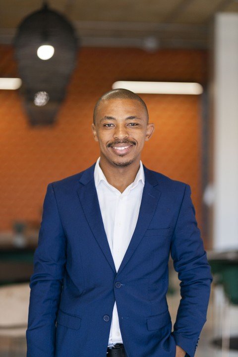 Black business man profile photo