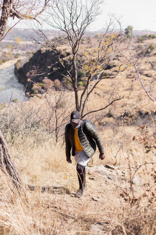 Black male hiking in the sun