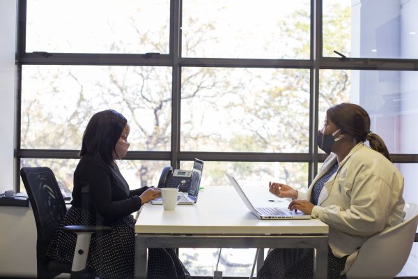 Business women in a meeting during covid-19