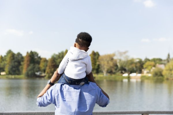 Father and son by the dam together