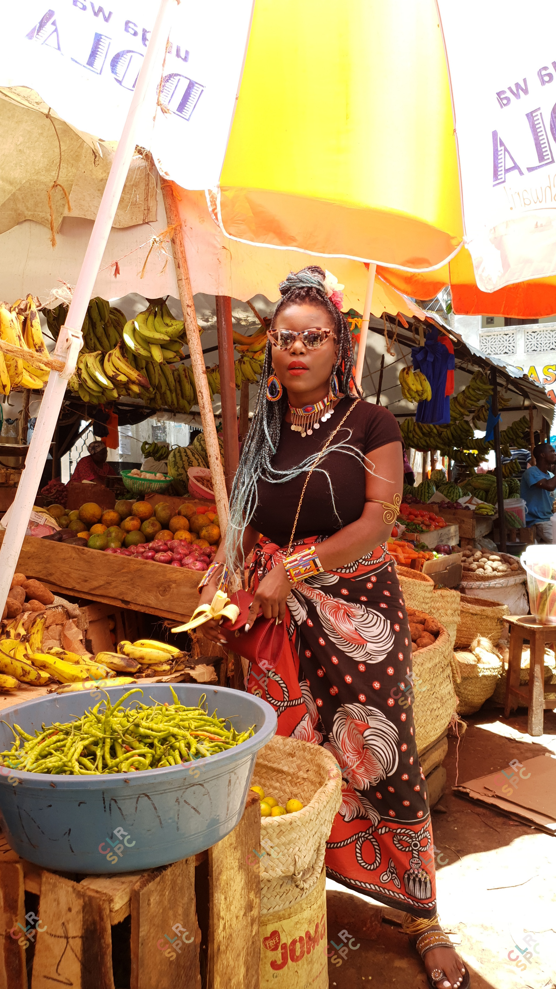 African woman at a fruit market