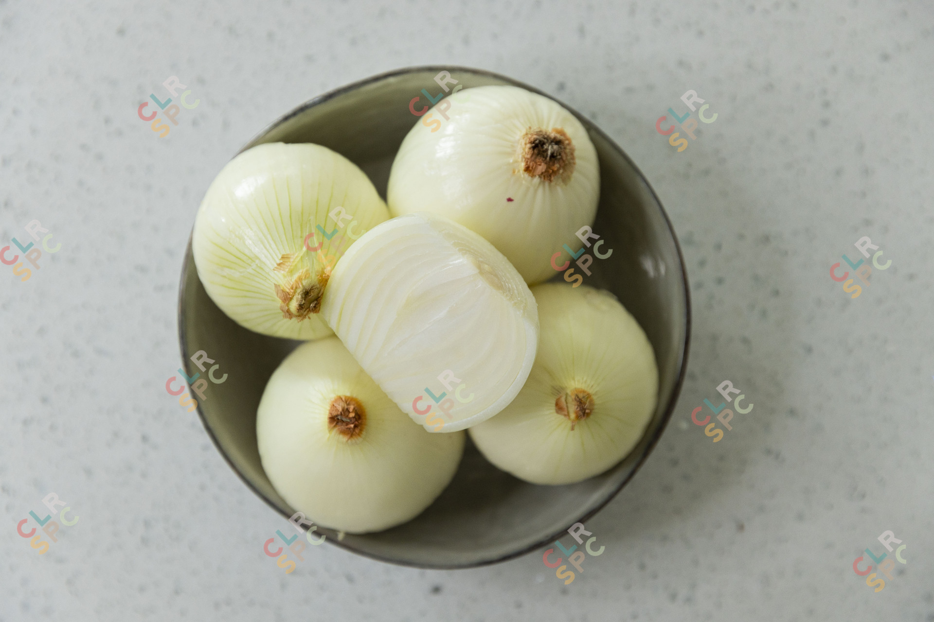 Pealed onions in a bowl