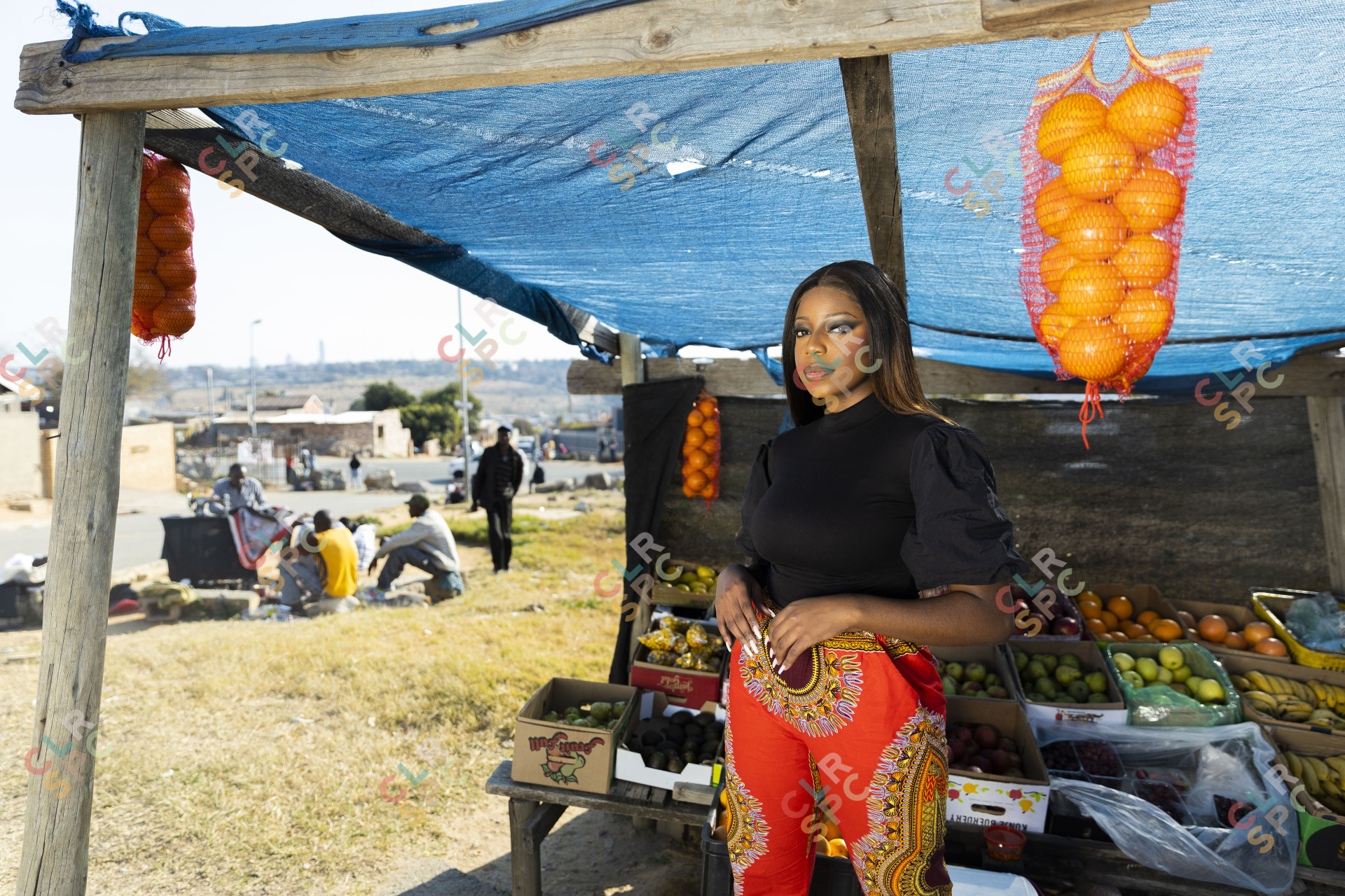 Black woman at the fruit market