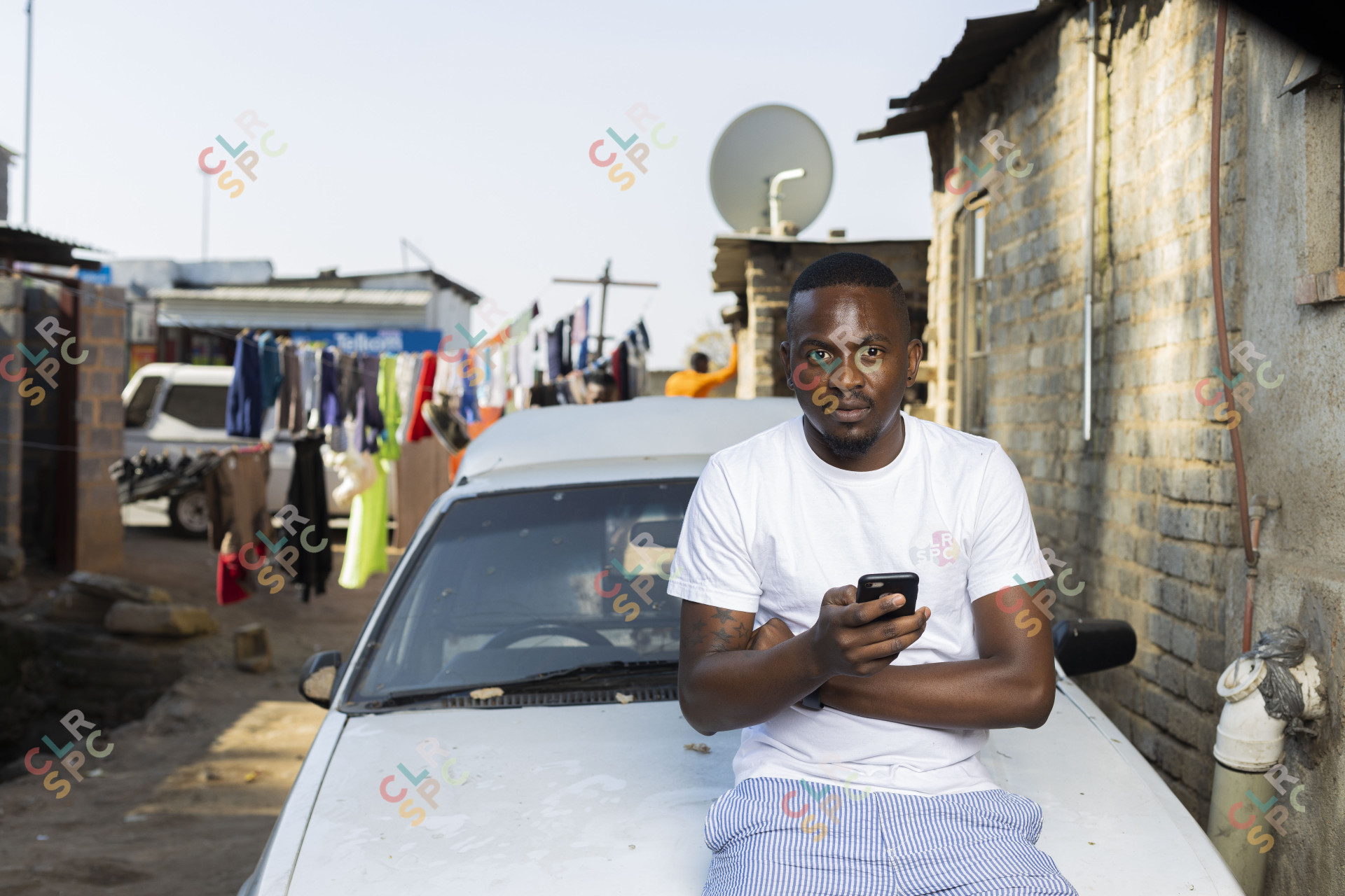 Holding a smartphone in Alex