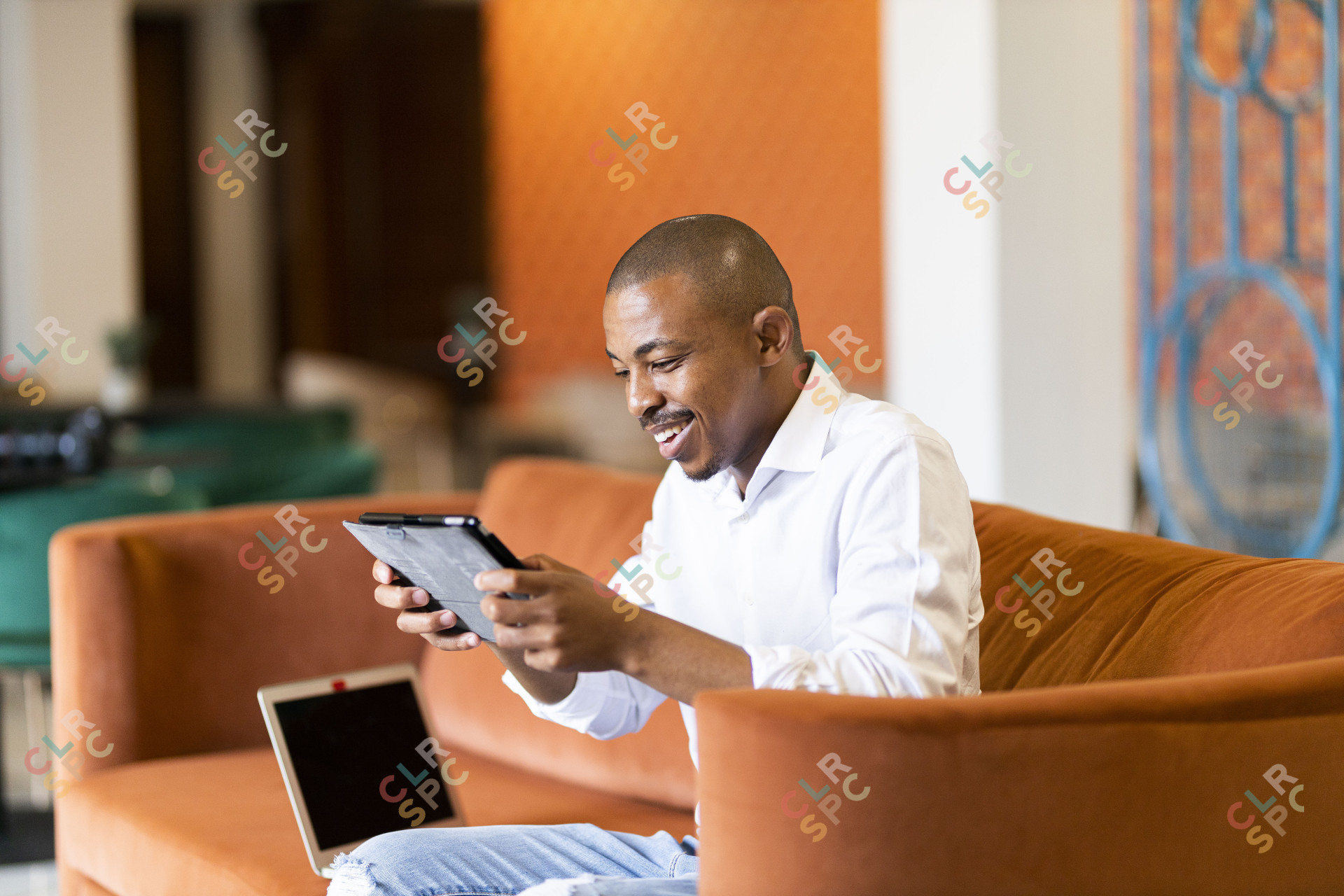 Black man working on ipad
