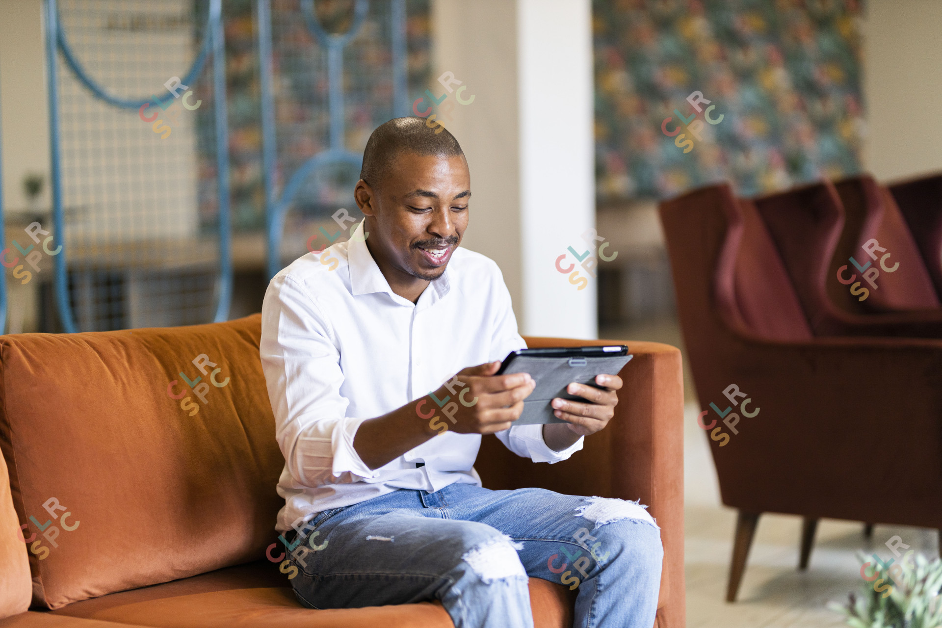 Black man working on ipad