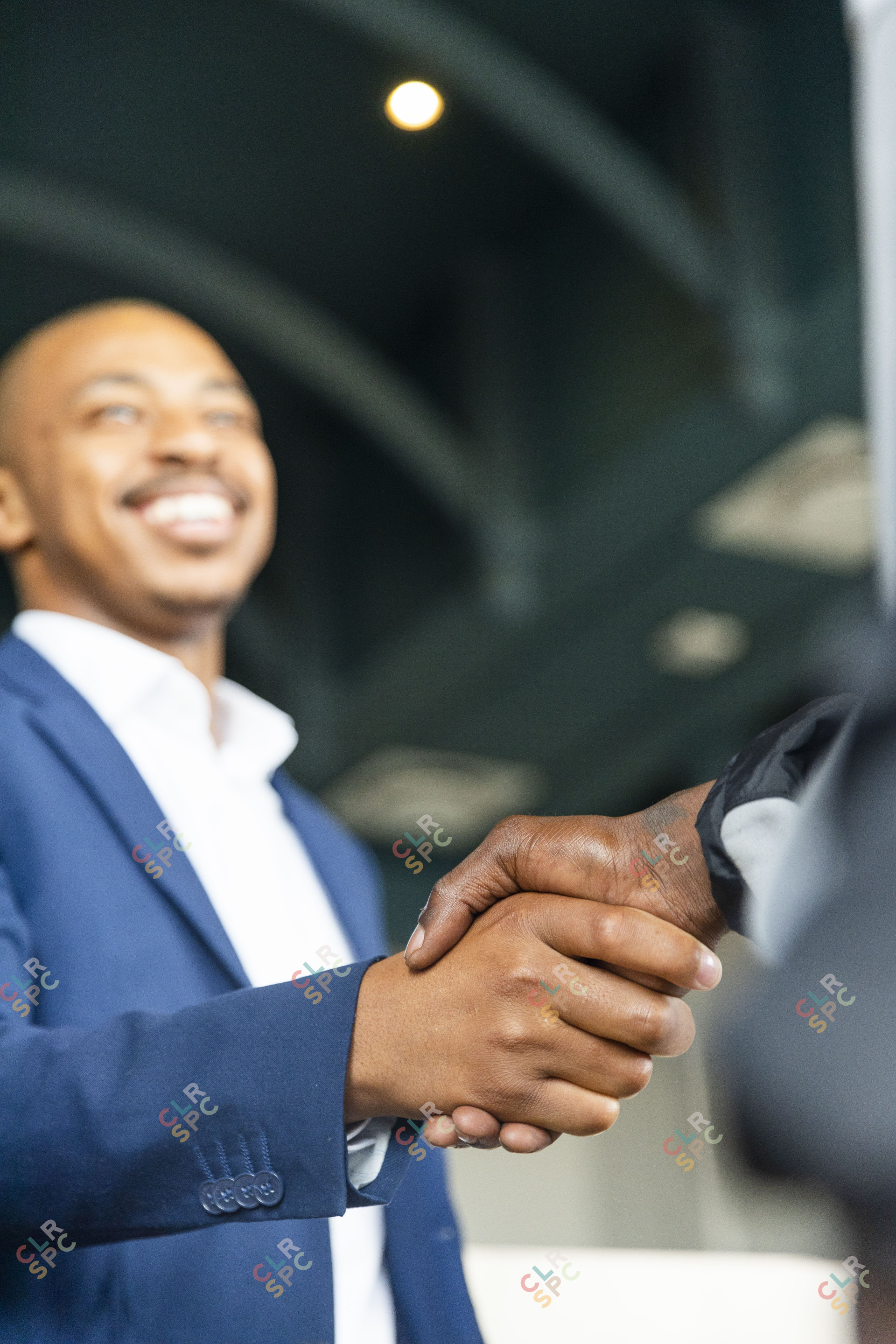 Black business man hand shaking hands with a client