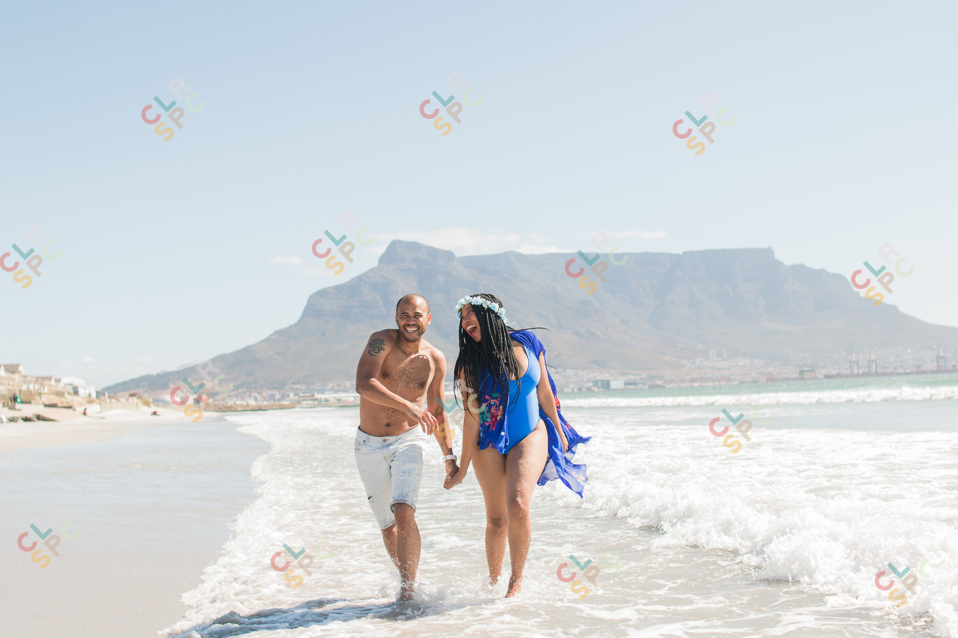 Lovers having fun in Cape Town water