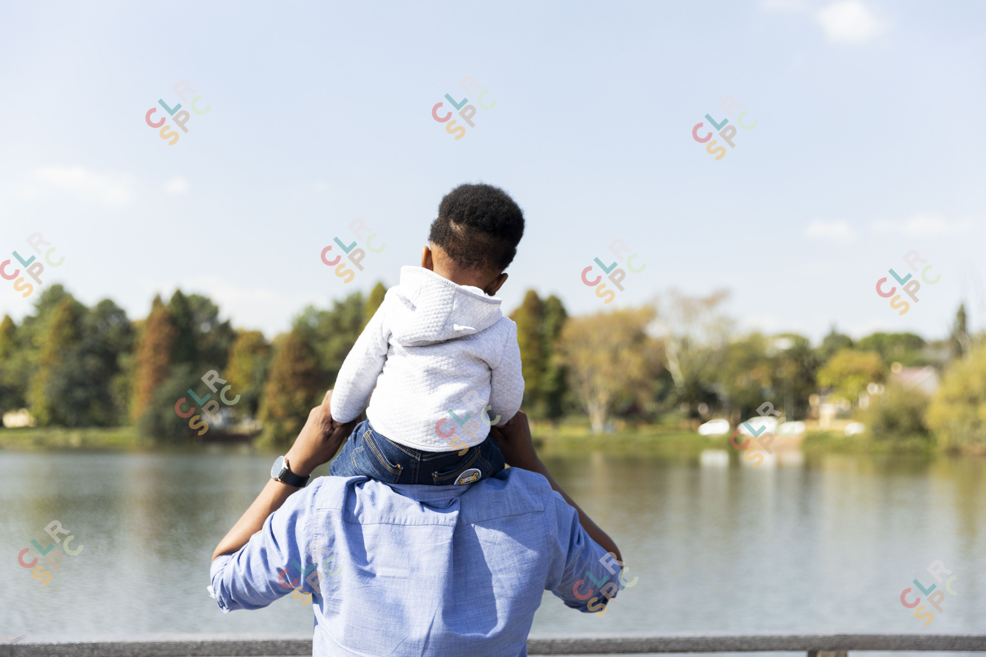 Father and son by the dam together