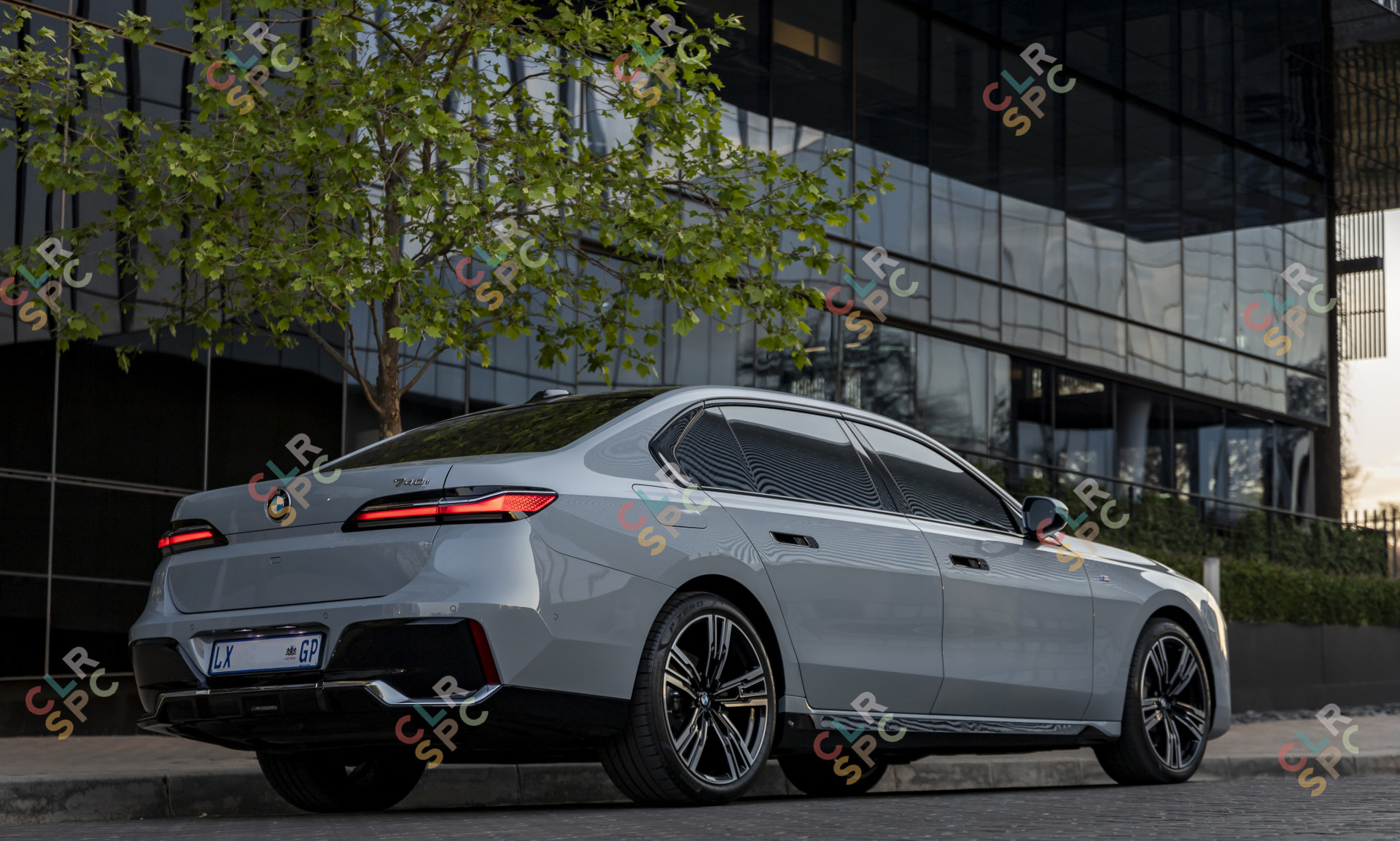 BMW i740i parked on the side of the road