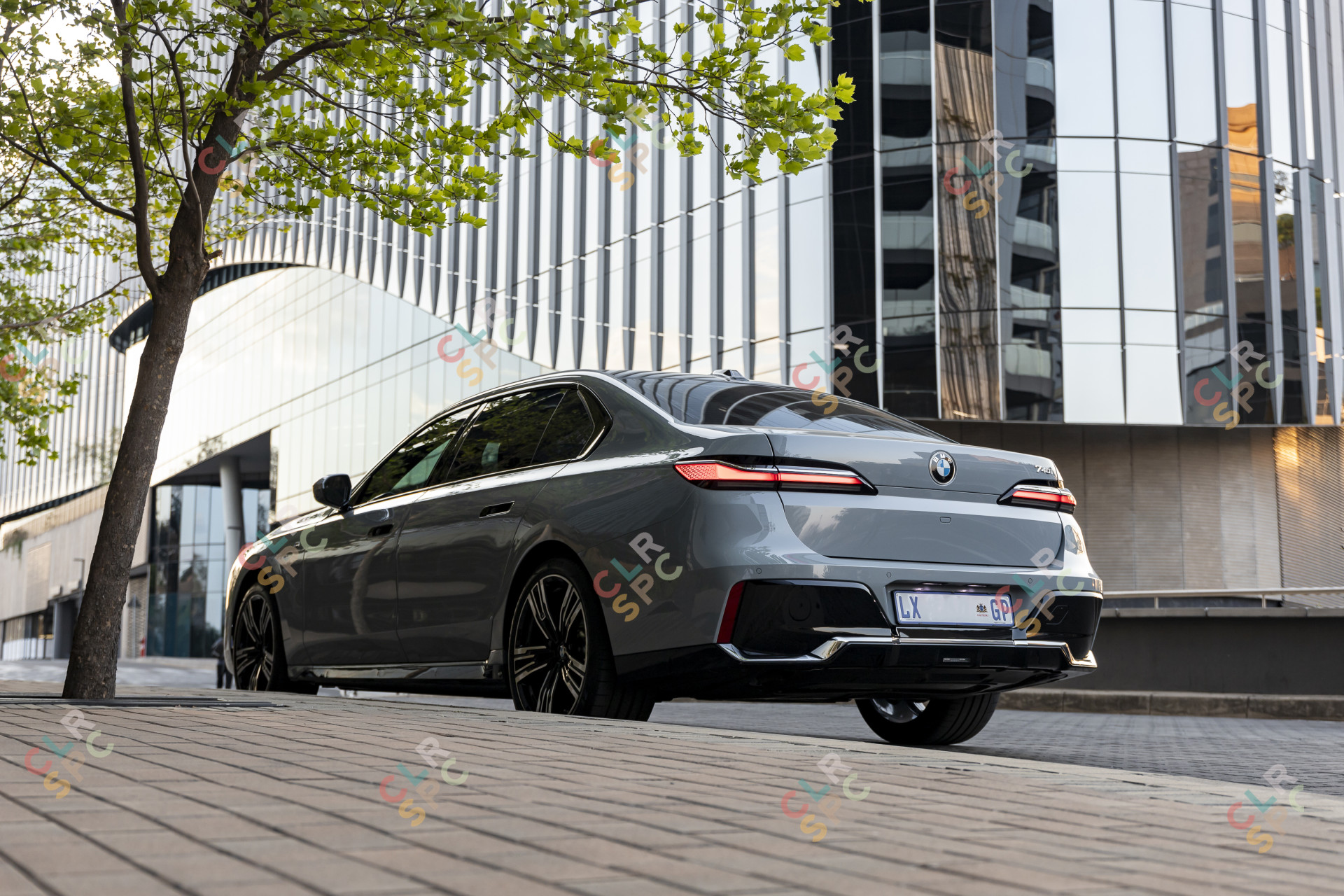 A very presidential BMW i740i parked on the side of the road