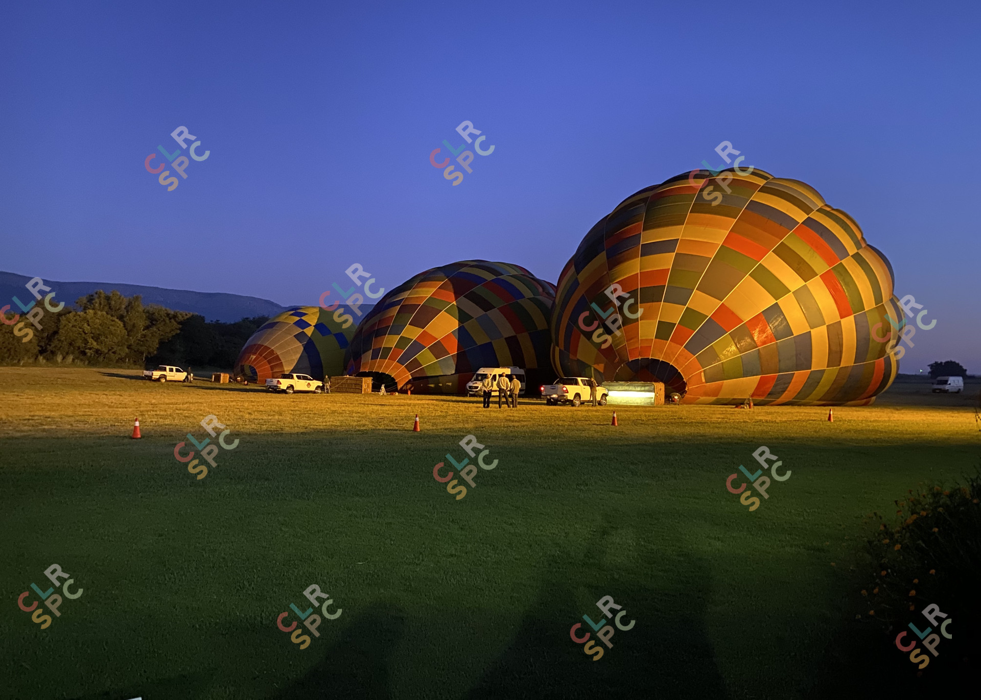 Inflating hot air balloon for a sunrise safari