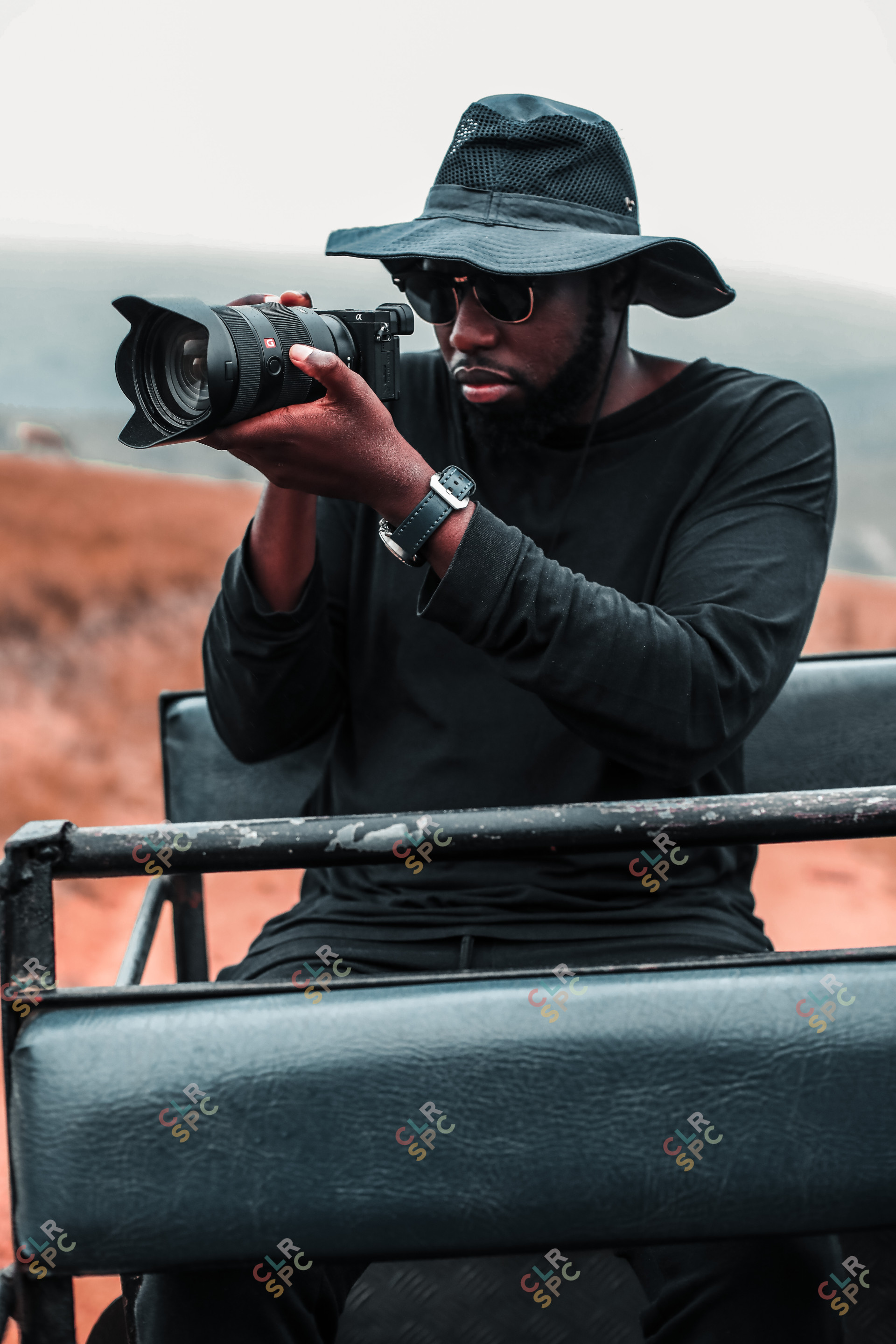 Black photographer on safari