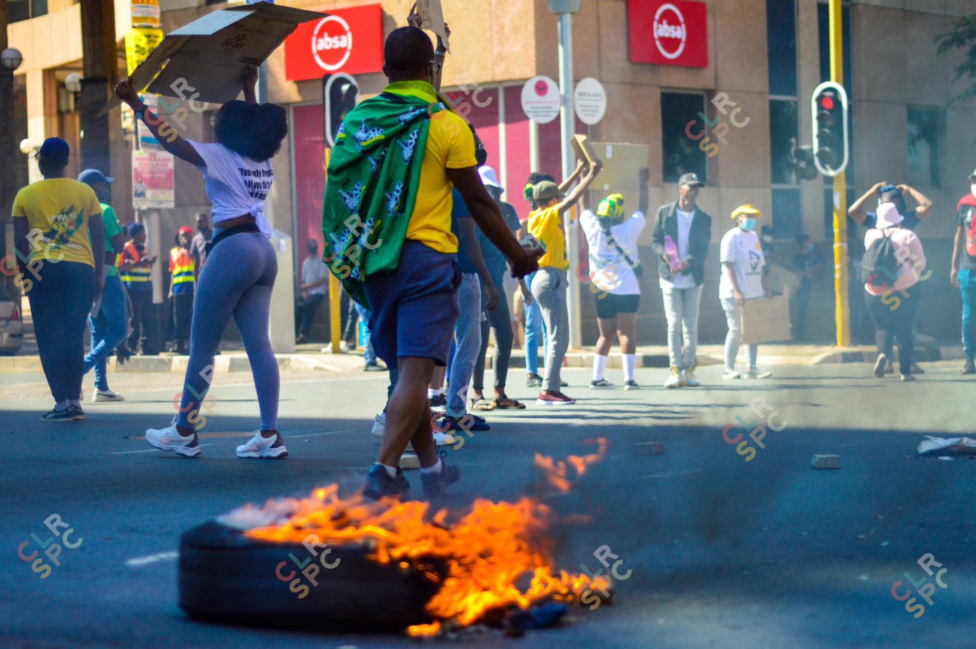 Students protesting  and burning tyres.