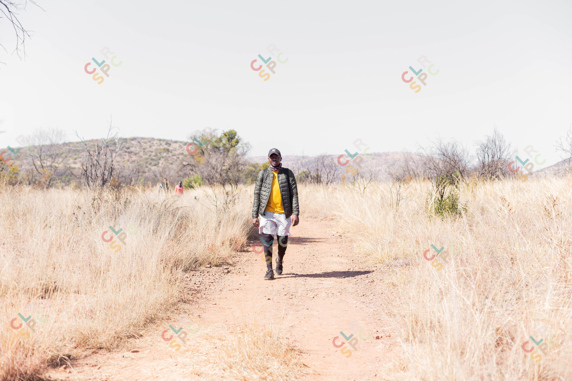 Black male hiking in the sun