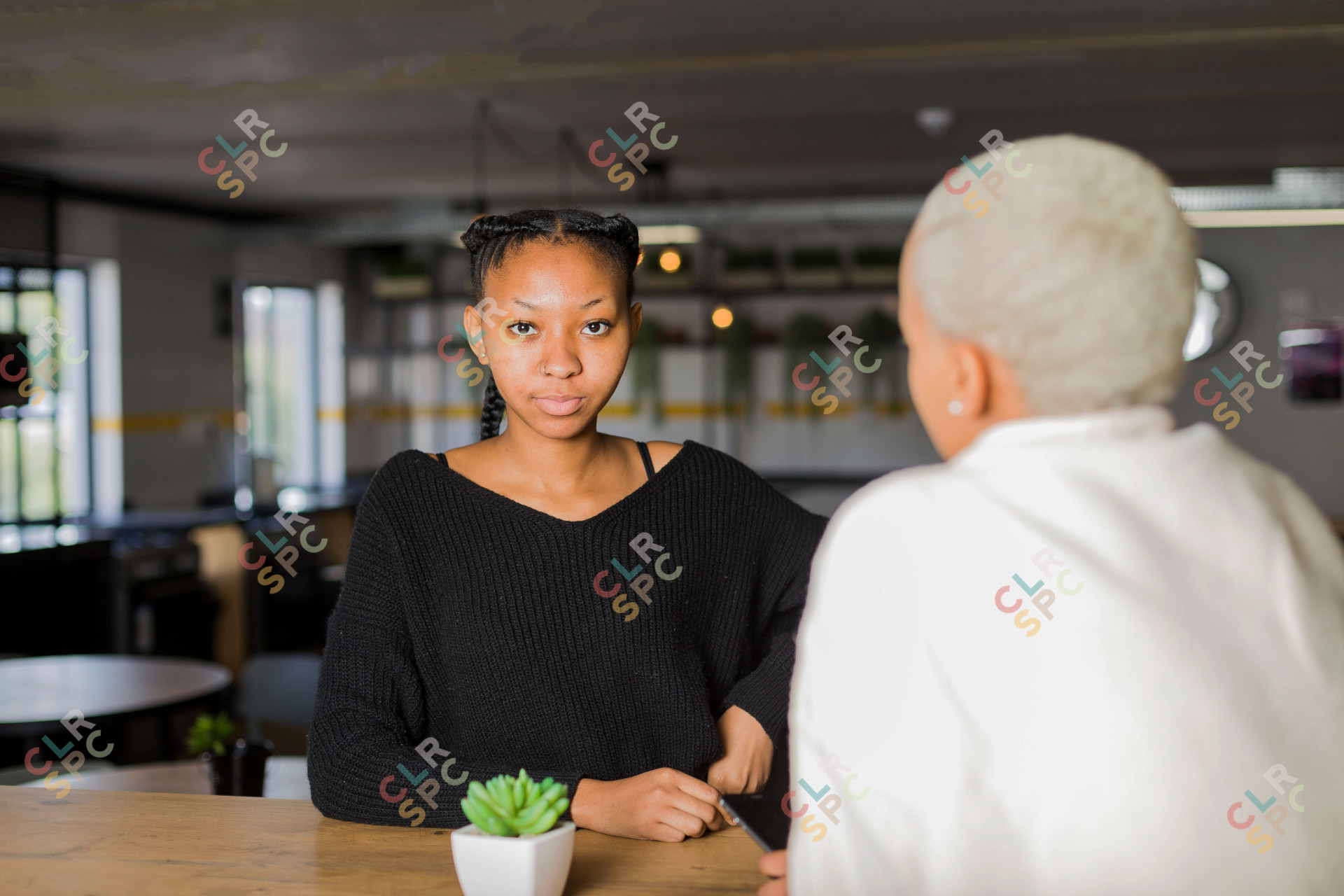 Black woman looking at the camera