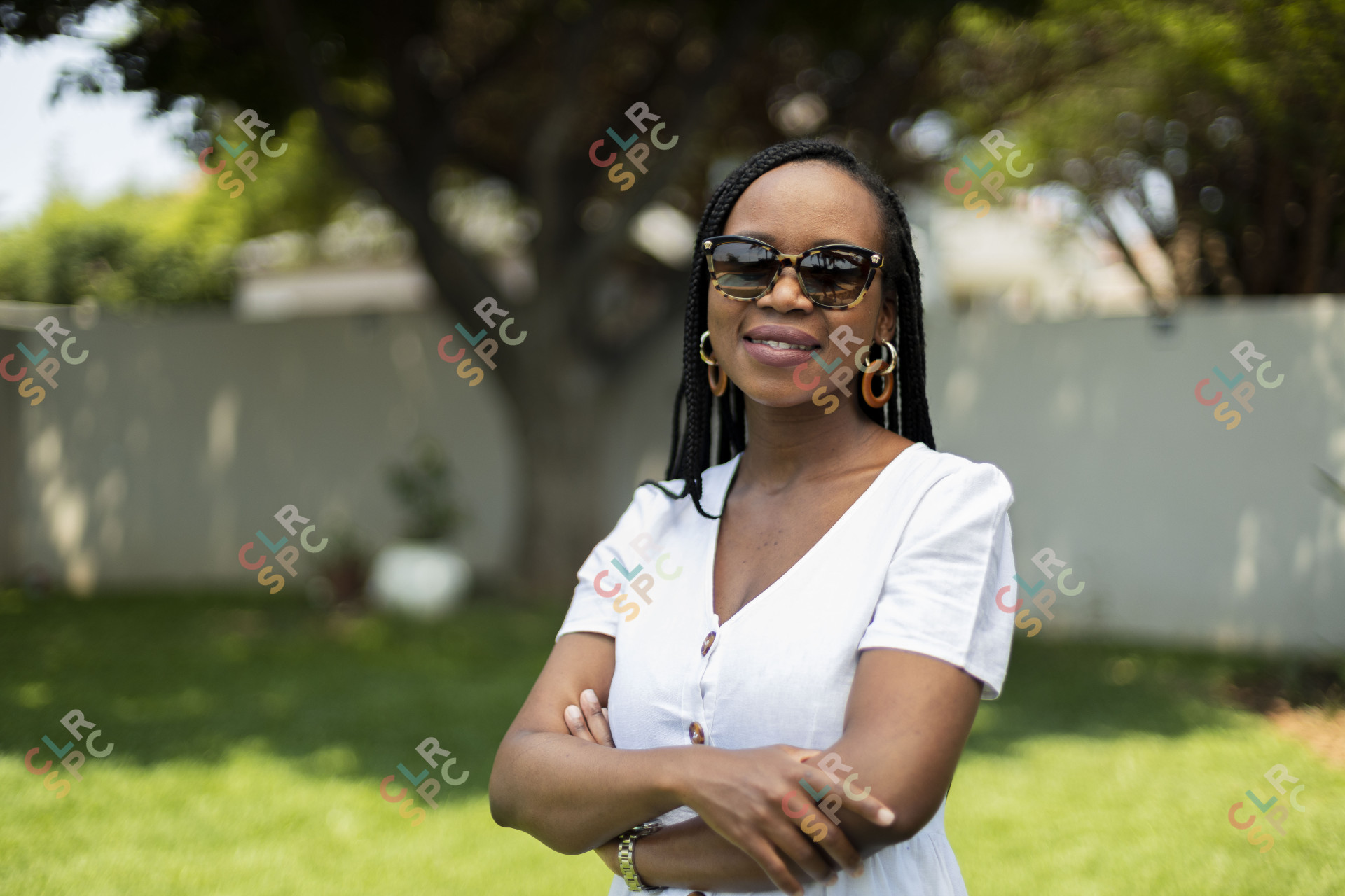 Black woman wearing glasses smiling