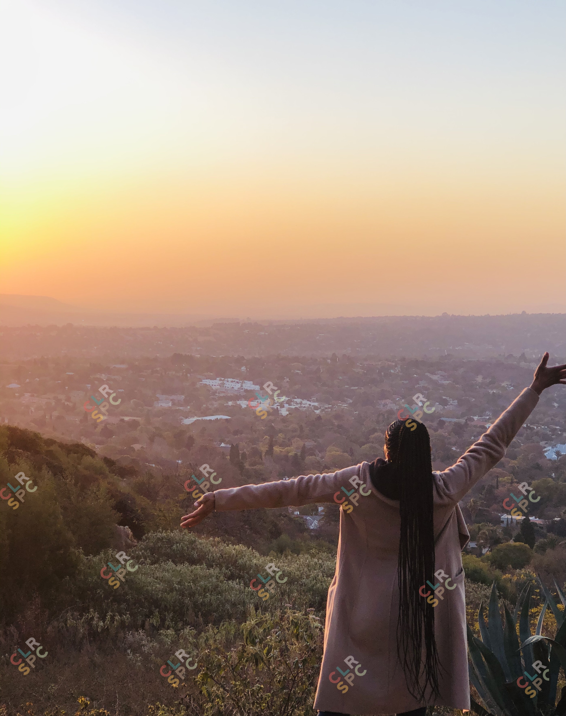 Black girl watching the sunset