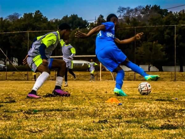 Soccer Player Dribbling