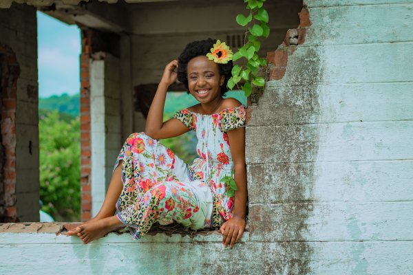 Black woman wearing a summer dress
