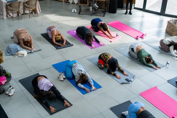 Women stretching at a yoga session